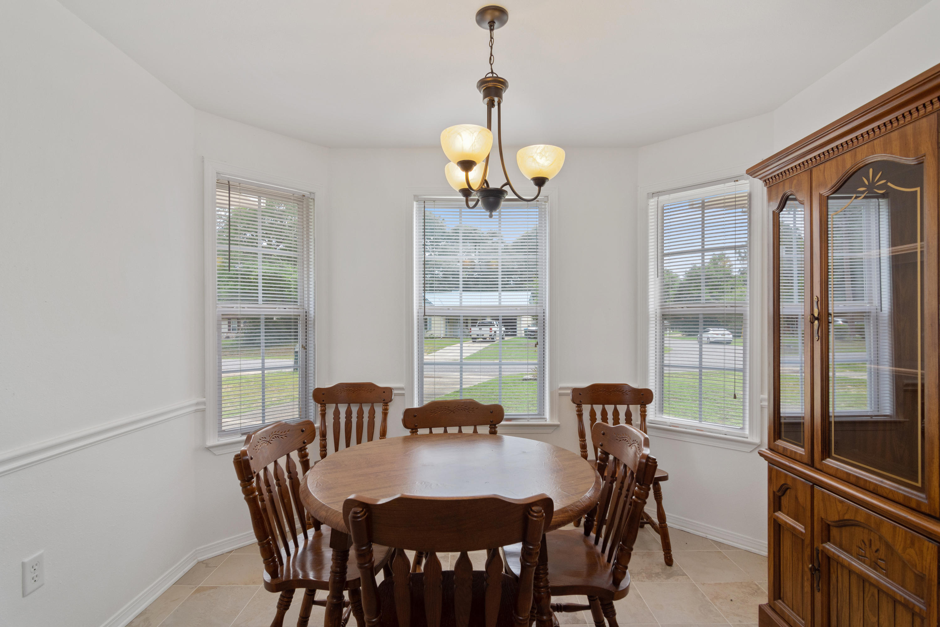 122 Springwood Circle Crestview, FL 32536 - Photo 9 of 27 a view of a dining room with furniture window and outside view