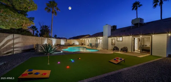 a view of a table and chairs in patio