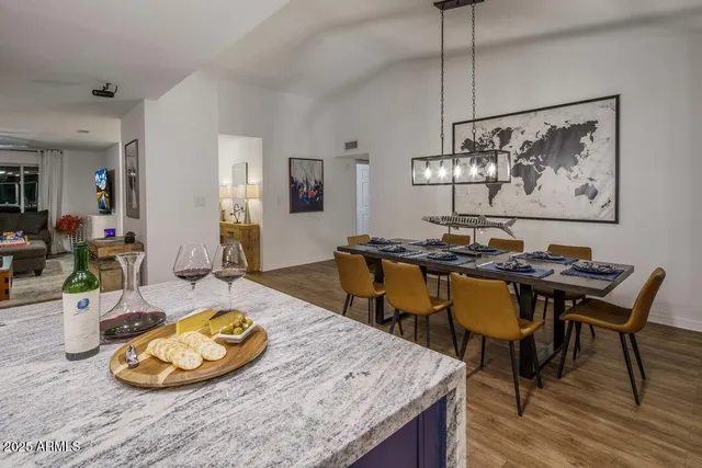 a view of a dining room with furniture