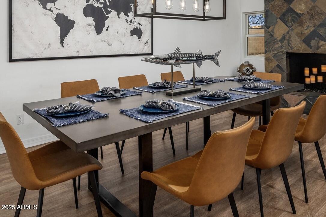 4526 East Paradise Lane Phoenix, AZ 85032 - Photo 16 of 48 a table and chairs in a kitchen next to a window
