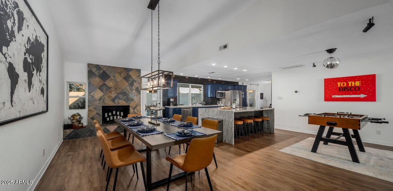4526 East Paradise Lane Phoenix, AZ 85032 - Photo 20 of 48 a view of a dining room with furniture window and wooden floor