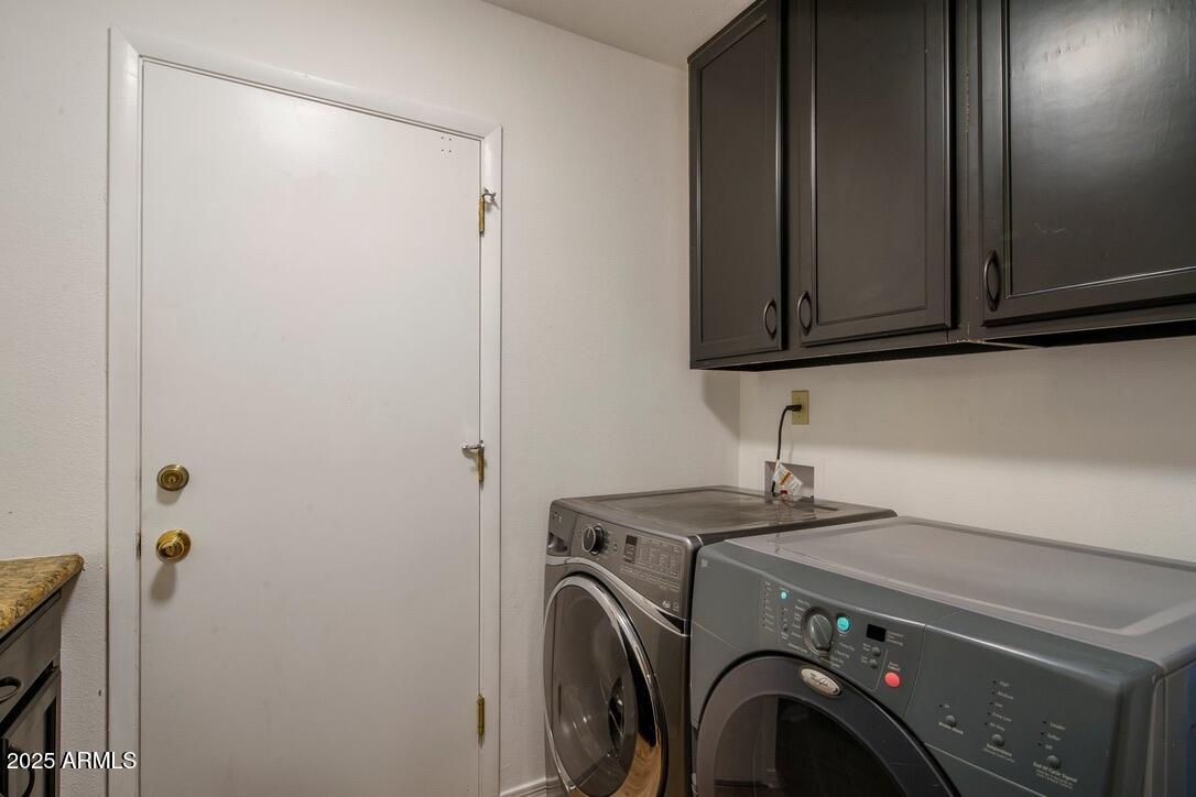 4526 East Paradise Lane Phoenix, AZ 85032 - Photo 32 of 48 a utility room with dryer and washer