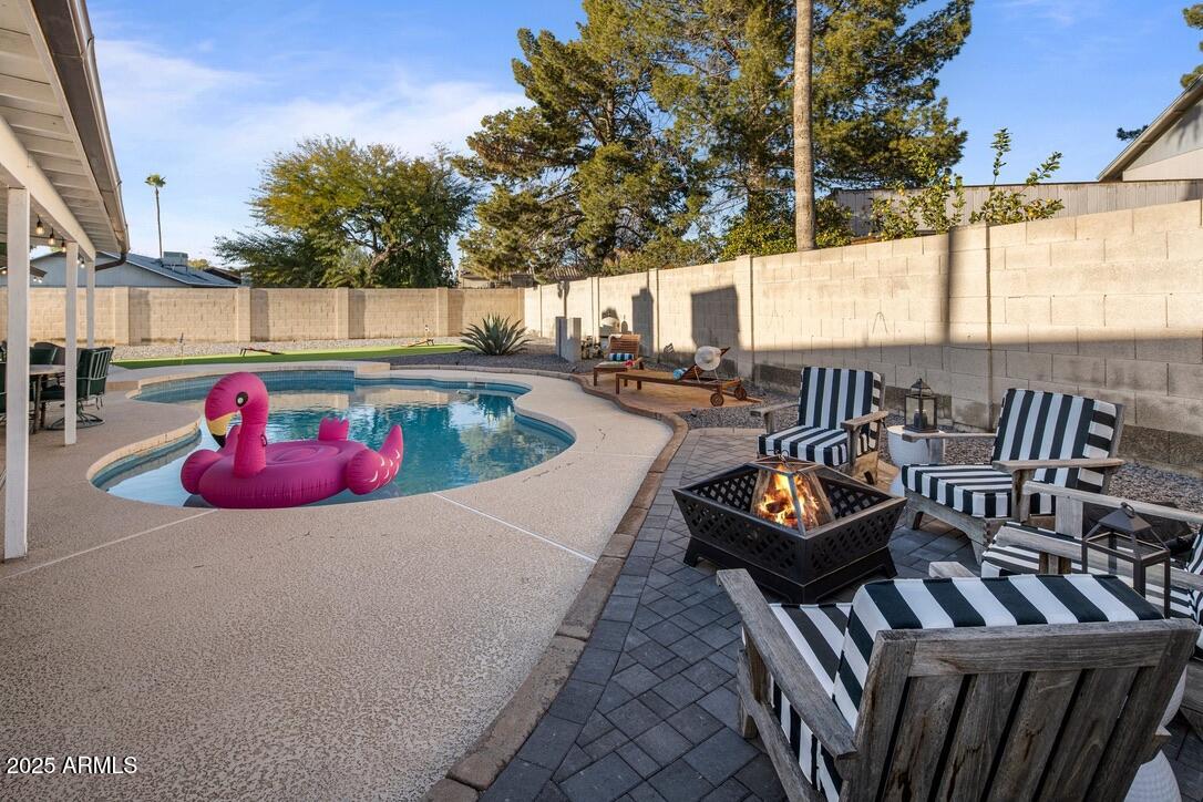 4526 East Paradise Lane Phoenix, AZ 85032 - Photo 37 of 48 an outdoor space with patio furniture