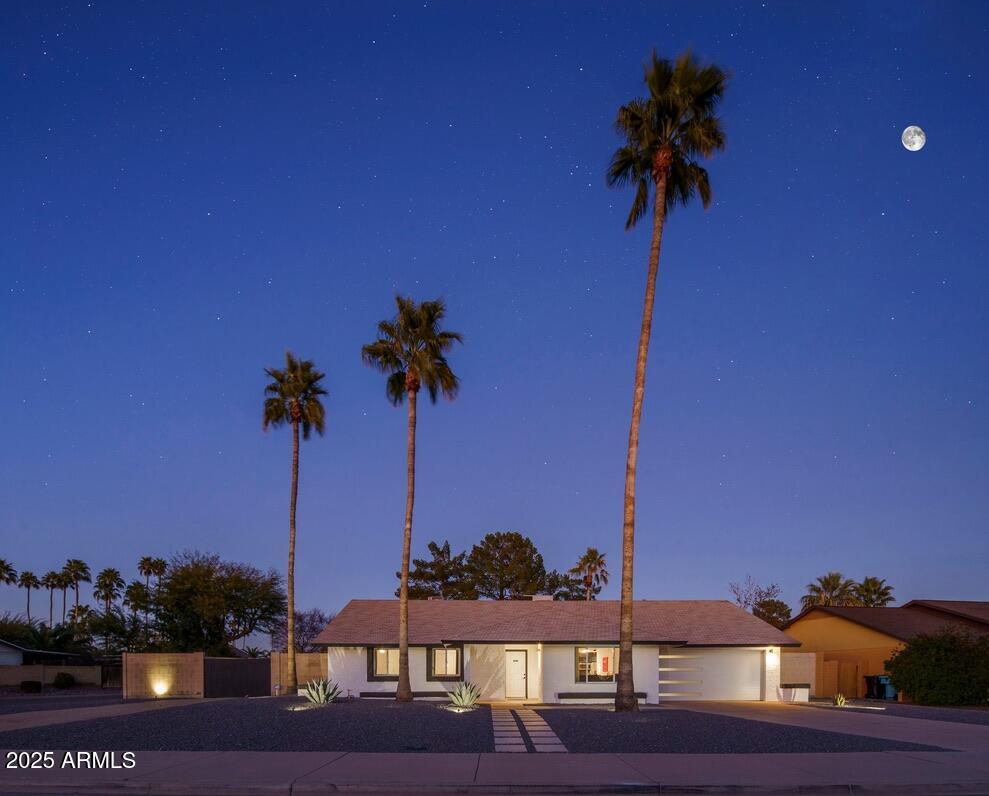 4526 East Paradise Lane Phoenix, AZ 85032 - Photo 48 of 48 a view of a city with a palm tree