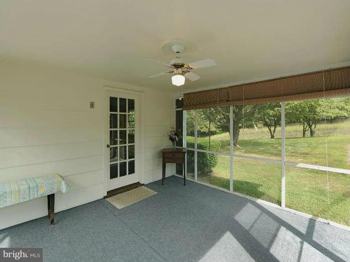View of side door from screened porch