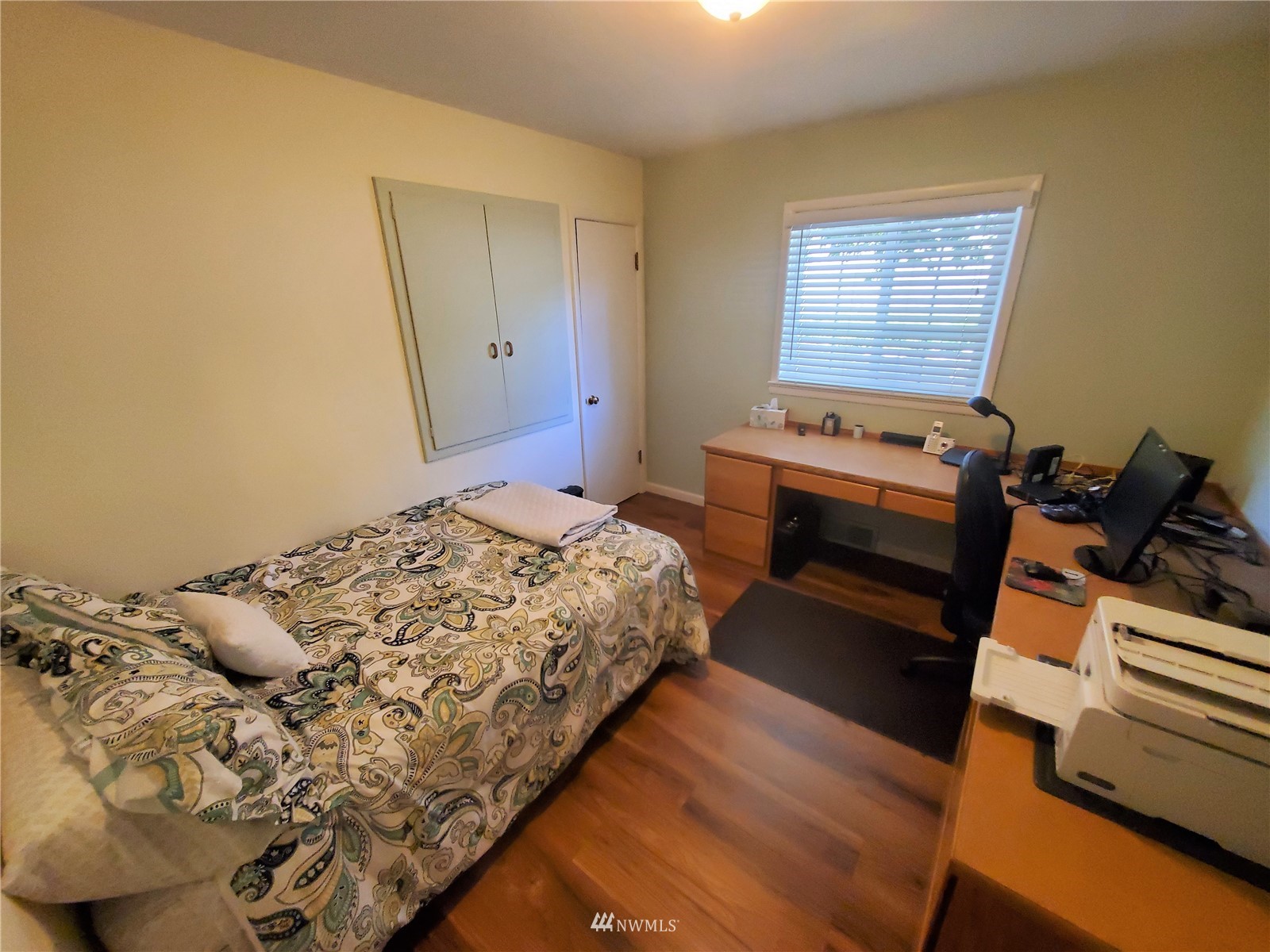 11 Haussler Road Omak, WA 98841 - Photo 16 of 40 a bedroom with a bed and a dresser