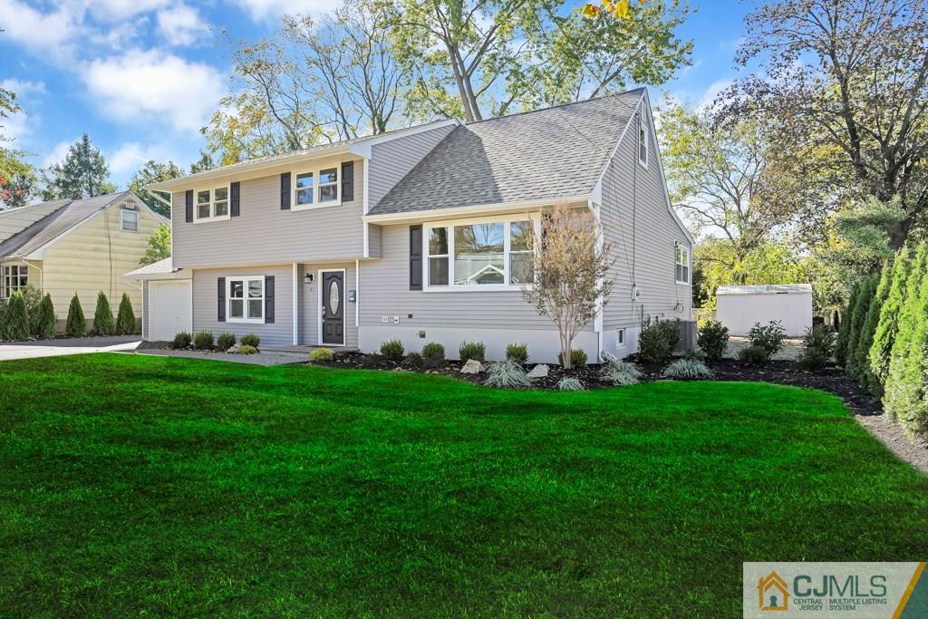 17 Greenbrook Road Middlesex, NJ 08846 - Photo 2 of 24 a view of a house with a backyard