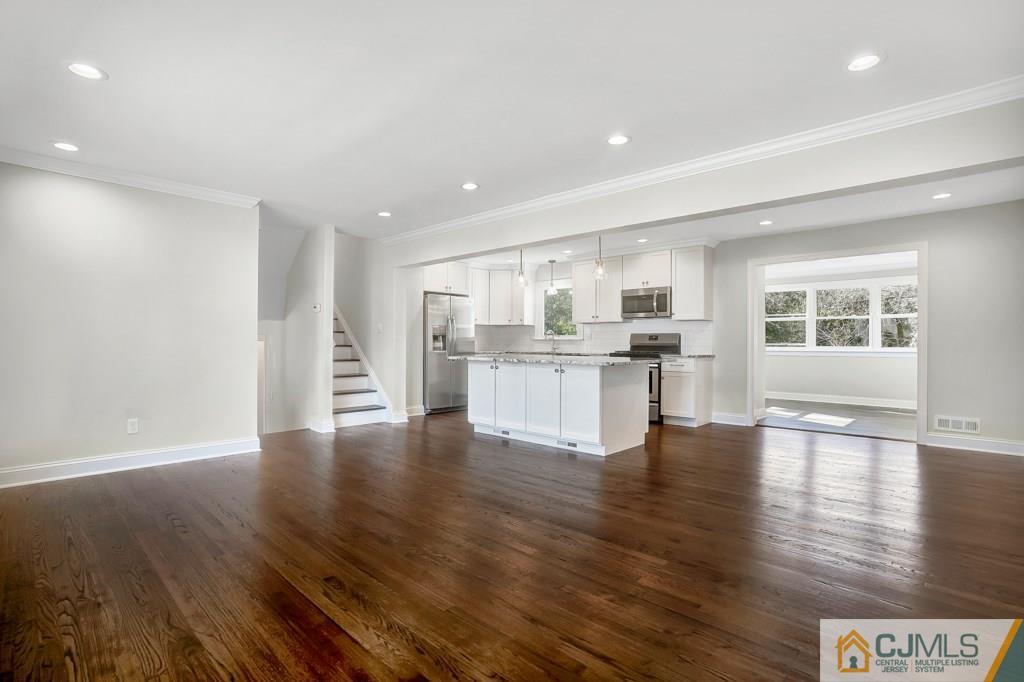 17 Greenbrook Road Middlesex, NJ 08846 - Photo 9 of 24 a view of kitchen with wooden floor and windows