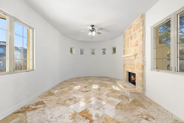 a kitchen with stainless steel appliances granite countertop a stove sink and cabinets