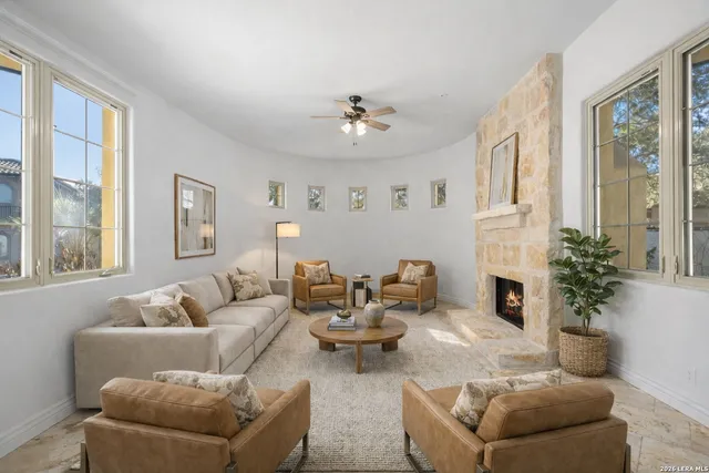 a large kitchen with kitchen island granite countertop a sink and a stove