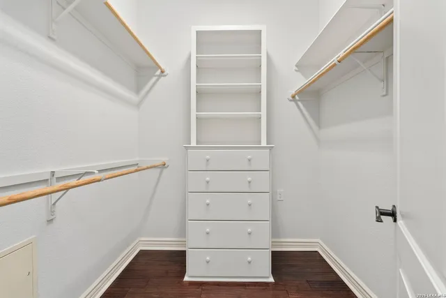 a bathroom with a sink double vanity and a shower