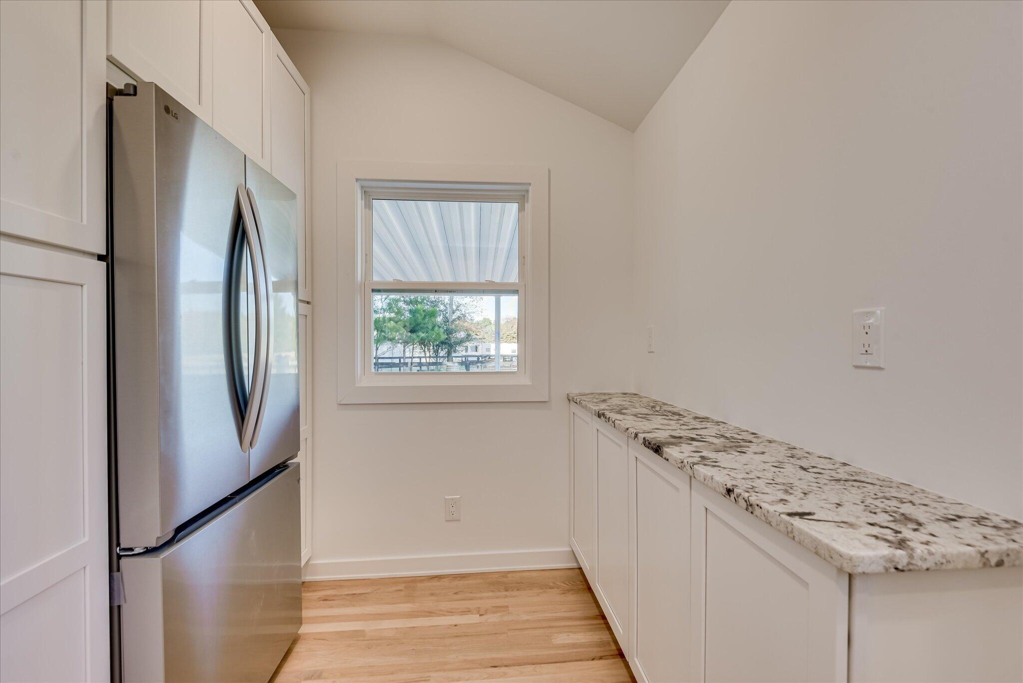 126 Mosley Road Aiken, SC 29801 - Photo 14 of 29 a view of a kitchen from the hallway