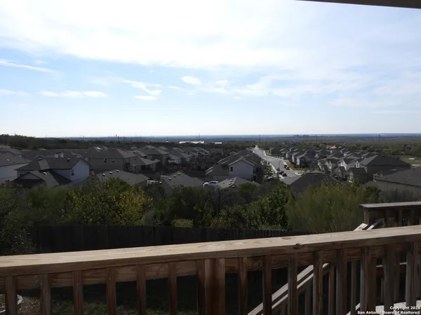 an aerial view of residential house with outdoor space