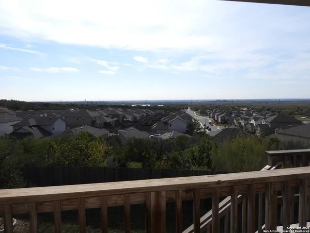 an aerial view of residential house with outdoor space
