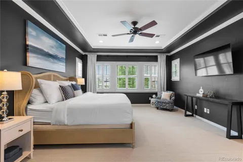 a bed room with a bed and a couch