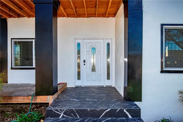 a front view of a house with yard