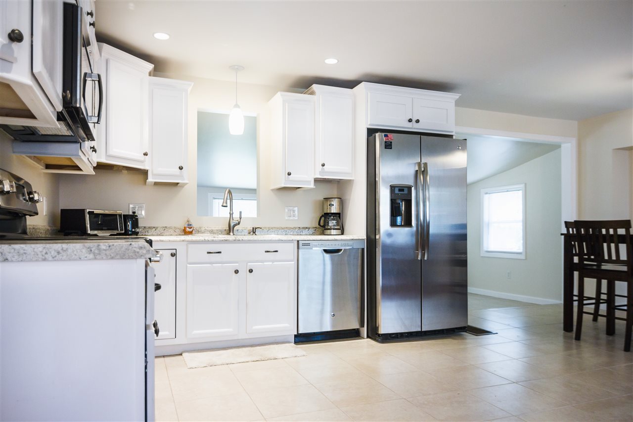 15 Kendall Pond Road, Unit B Londonderry, NH 03053 - Photo 3 of 25