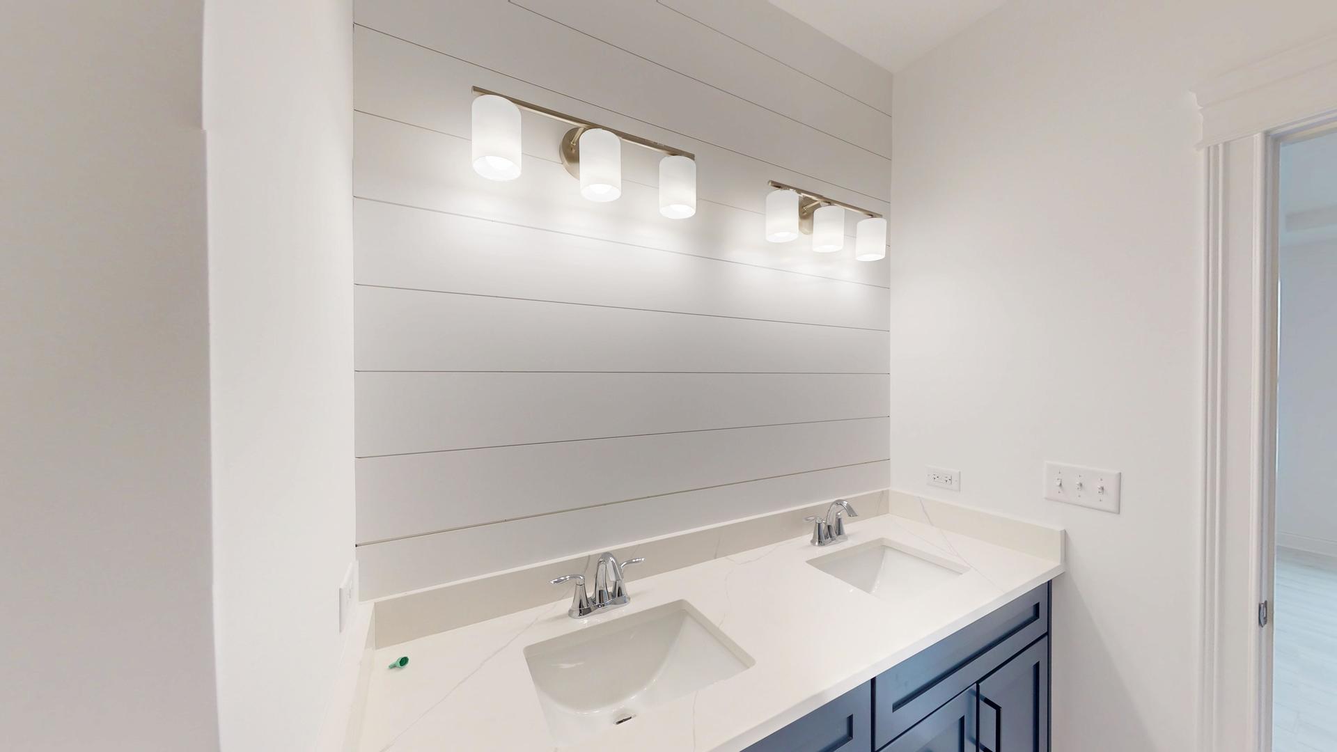 1S980 Deerpath Road Batavia, IL 60510 - Photo 24 of 43 a bathroom with a sink and a mirror