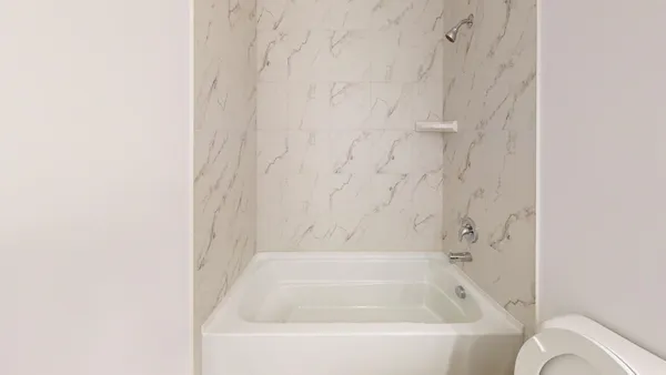 a bathroom with a bathtub