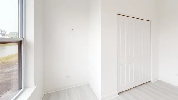 an empty room with windows