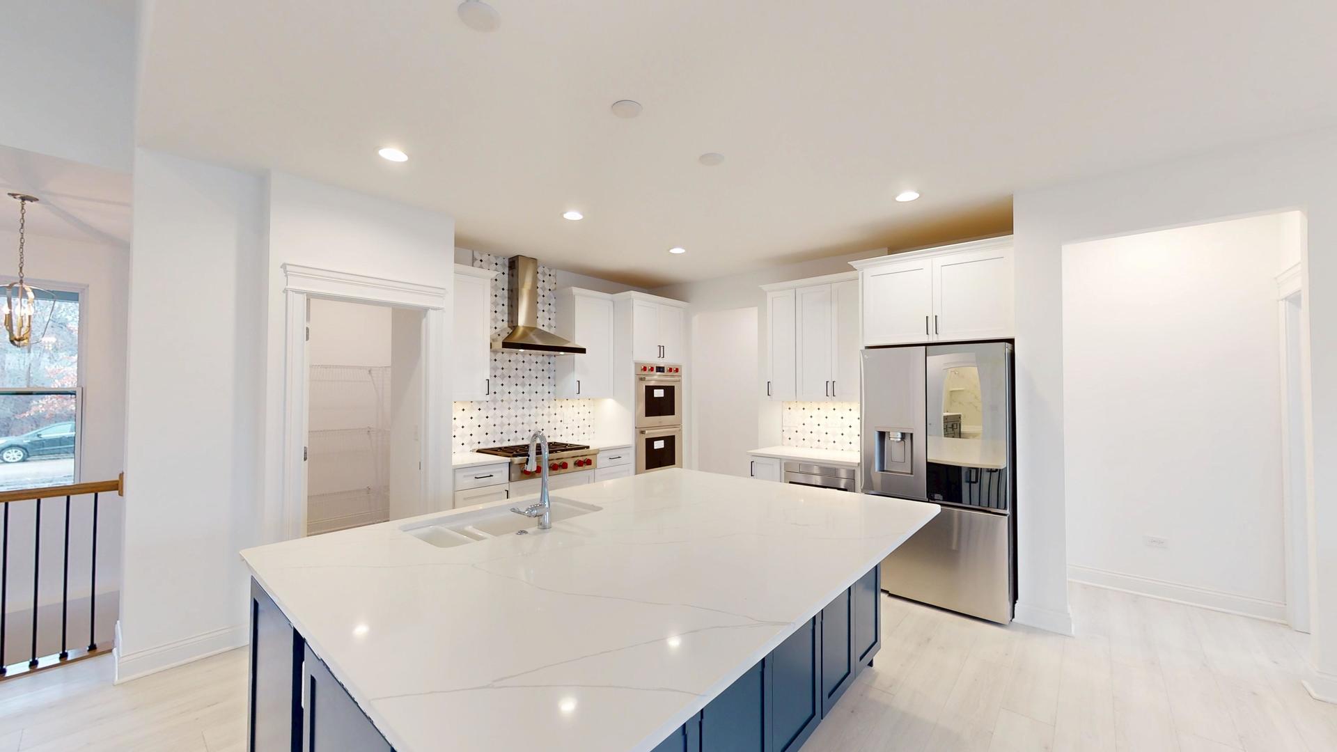 1S980 Deerpath Road Batavia, IL 60510 - Photo 3 of 43 a large kitchen with a table and chairs