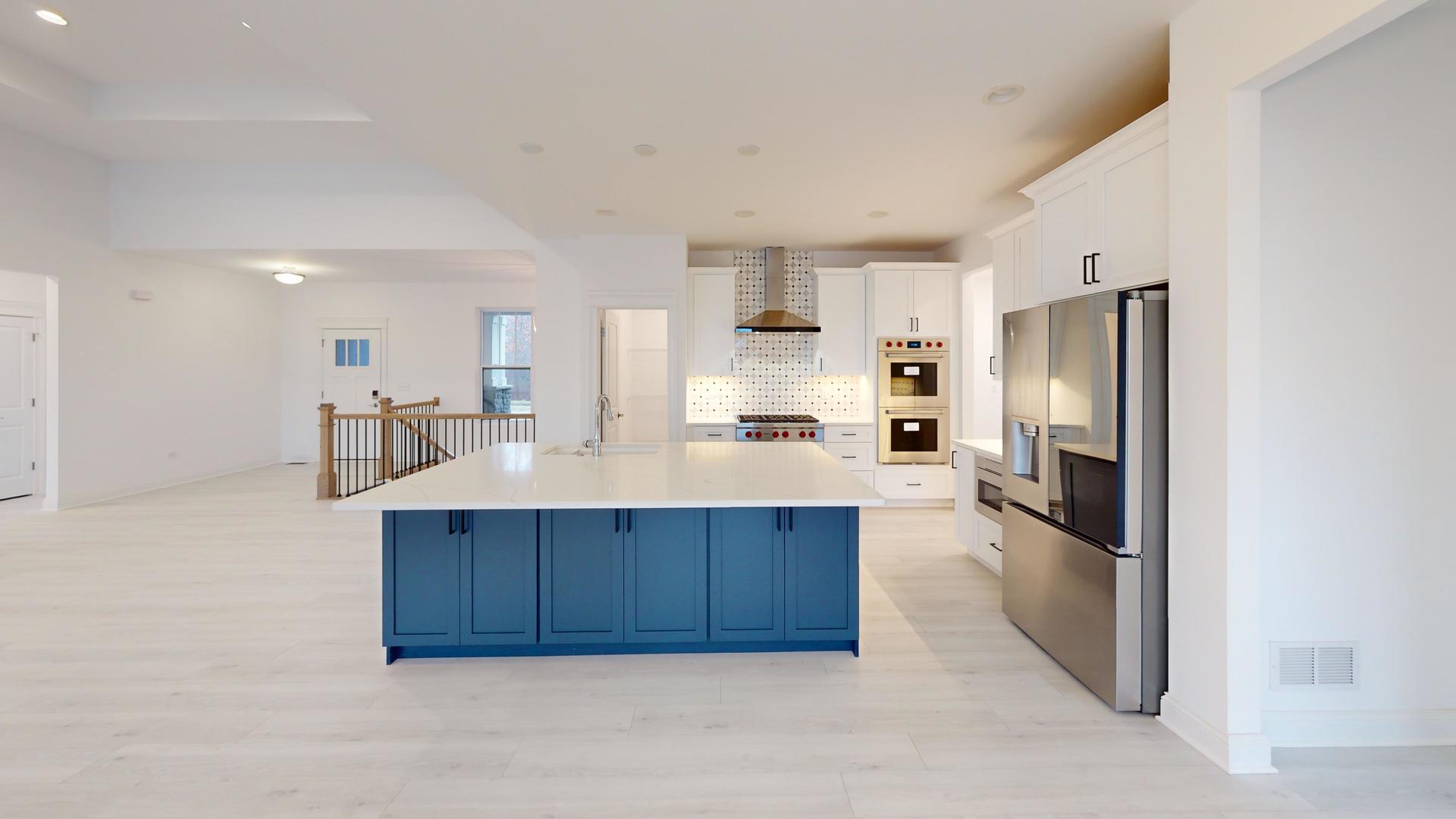 1S980 Deerpath Road Batavia, IL 60510 - Photo 9 of 43 a kitchen with a refrigerator and a sink