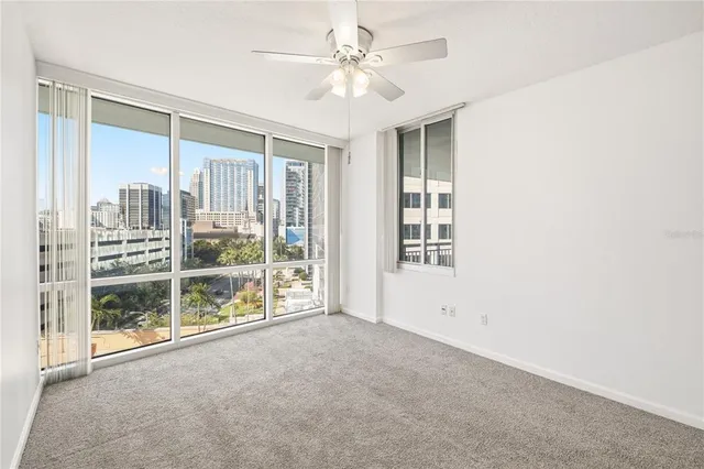 a view of an empty room with a window