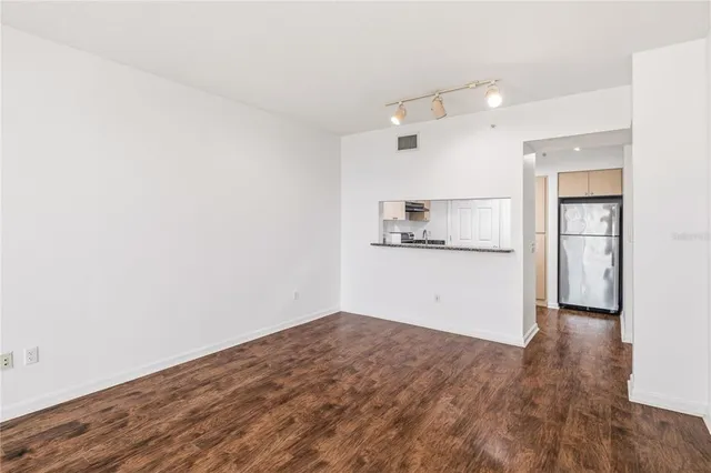 a view of kitchen with wooden floor
