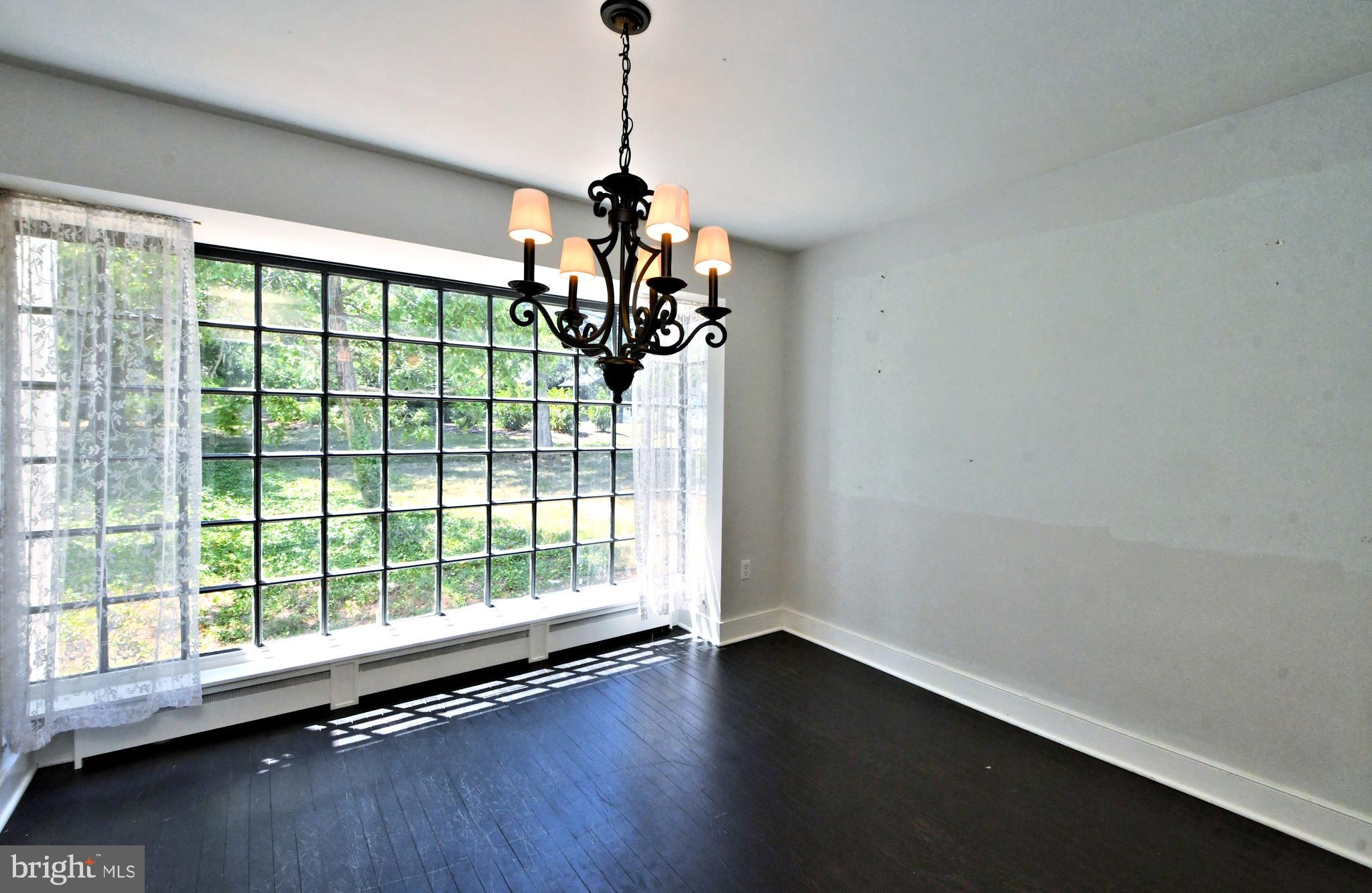 143 Old York Road New Hope, PA 18938 - Photo 16 of 70 a view of a livingroom with wooden floor and a window