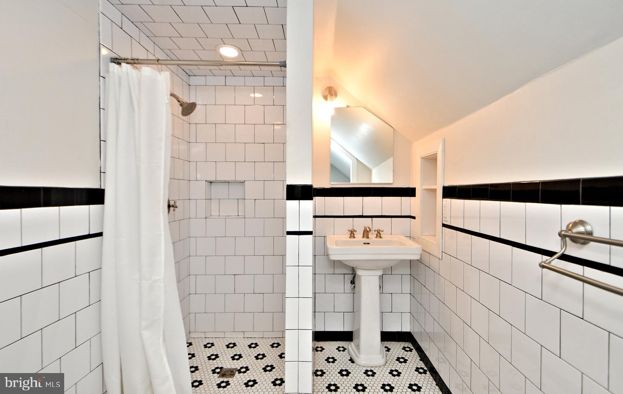 143 Old York Road New Hope, PA 18938 - Photo 48 of 70 a bathroom with a sink a toilet and shower