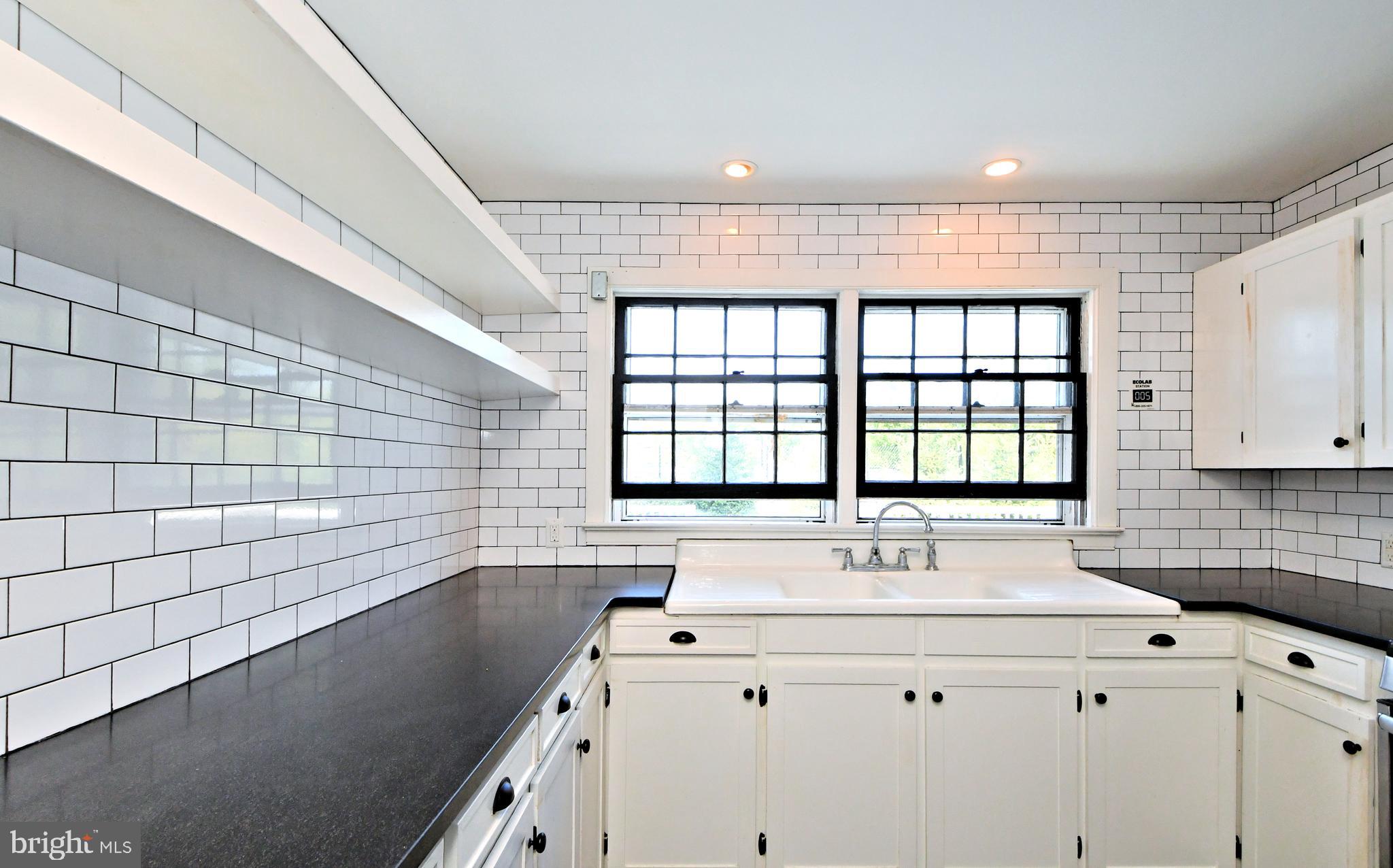 143 Old York Road New Hope, PA 18938 - Photo 10 of 70 a view of a bathroom with a sink and a window