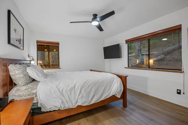 a large white bed in a white room