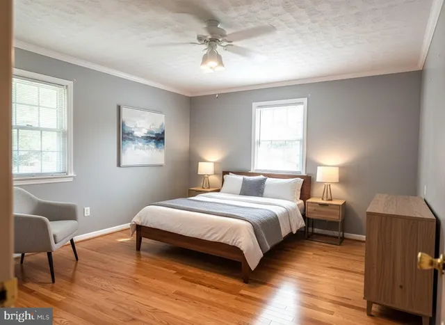 a bathroom with a sink toilet a mirror and shower