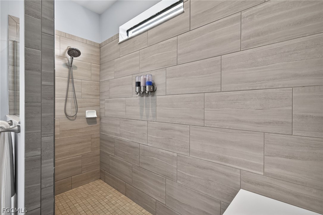 11914 Bourke Place Fort Myers, FL 33913 - Photo 22 of 49 a bathroom with a shower