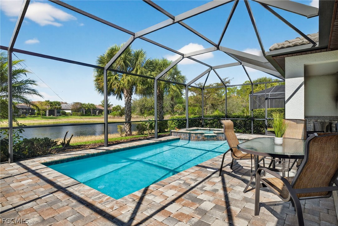 11914 Bourke Place Fort Myers, FL 33913 - Photo 31 of 49 a view of a backyard with sitting area
