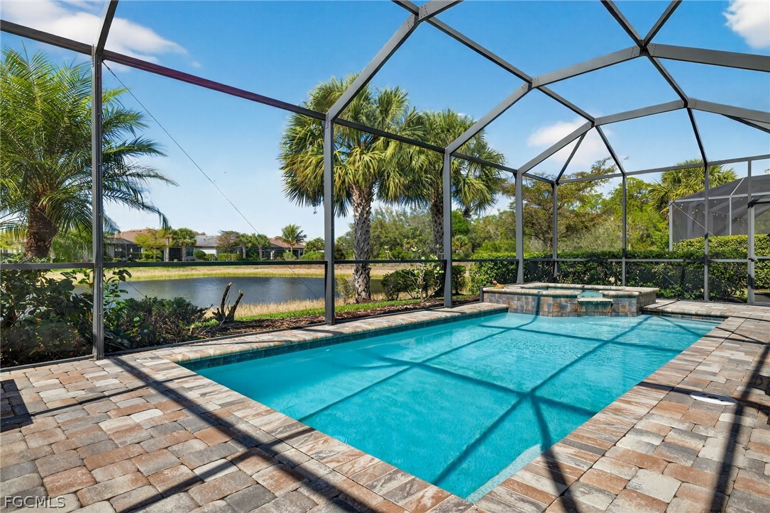 11914 Bourke Place Fort Myers, FL 33913 - Photo 33 of 49 a view of a swimming pool with a patio