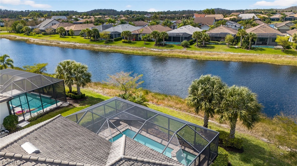 11914 Bourke Place Fort Myers, FL 33913 - Photo 37 of 49 an aerial view of a house with a lake view