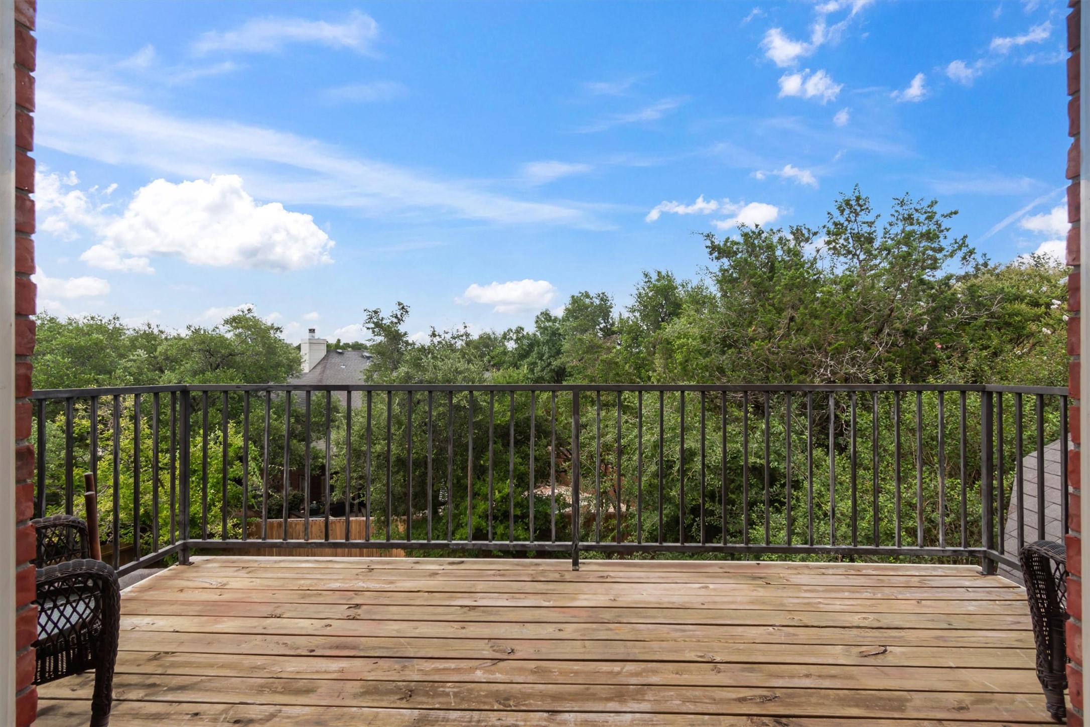 6008 Tributary Ridge Court Austin, TX 78759 - Photo 21 of 36 A spacious 2nd floor deck provides elevated views of the tree-filled neighborhood.