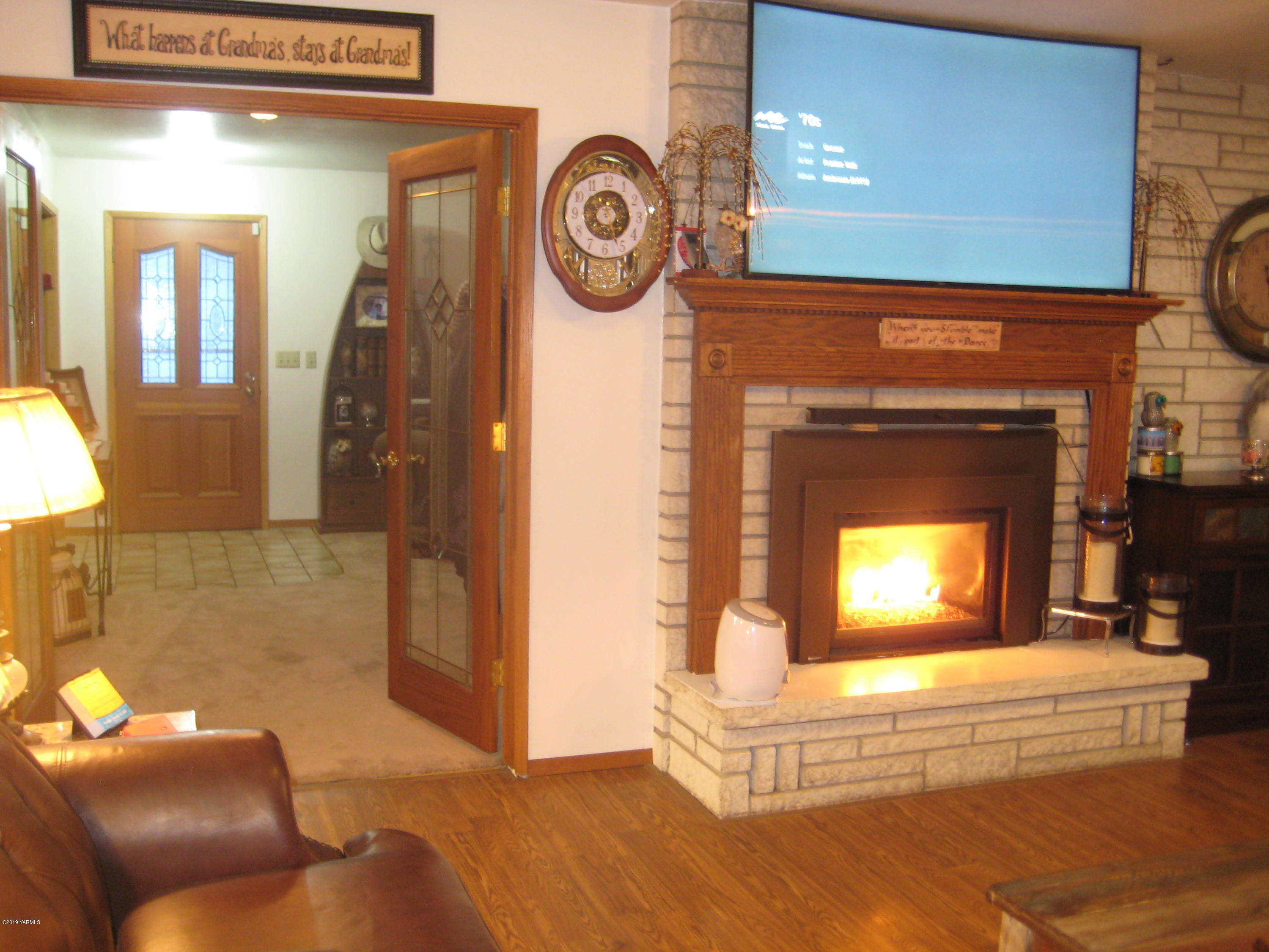 5900 Ashue Road Wapato, WA 98951 - Photo 12 of 60 a view of livingroom with furniture and a fireplace