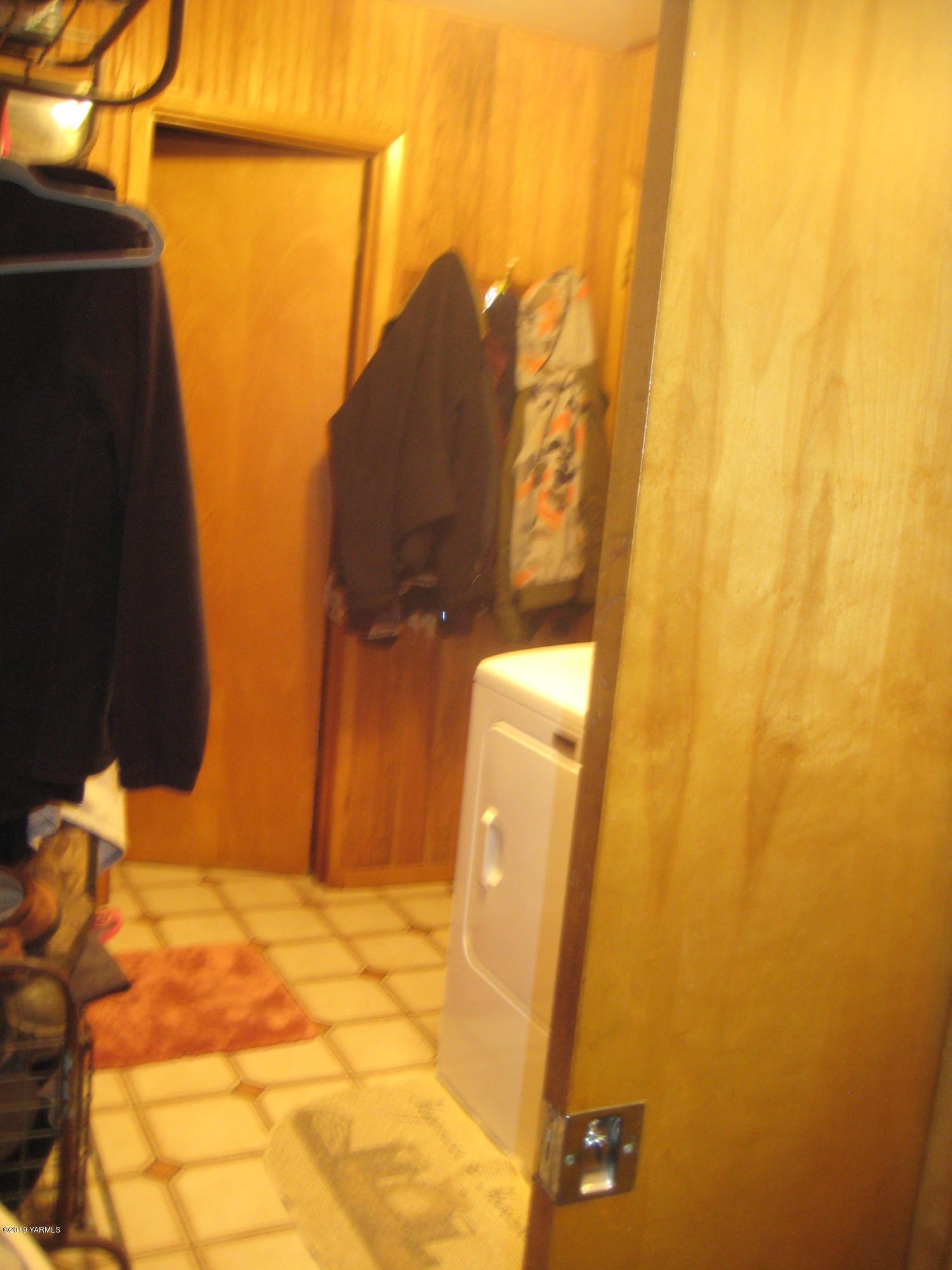 5900 Ashue Road Wapato, WA 98951 - Photo 24 of 60 Pocket door to laundry