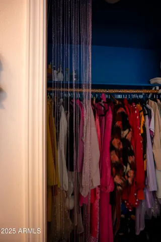 a close up view of a walk in closet