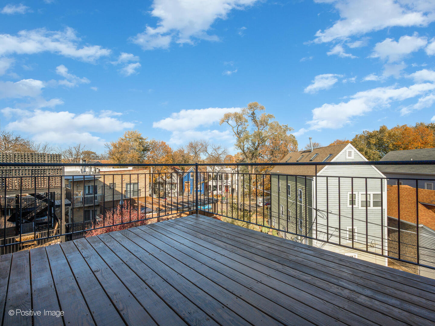 3053 North Clybourn Avenue, Unit 3 Chicago, IL 60618 - Photo 13 of 24 a view of wooden balcony with city view