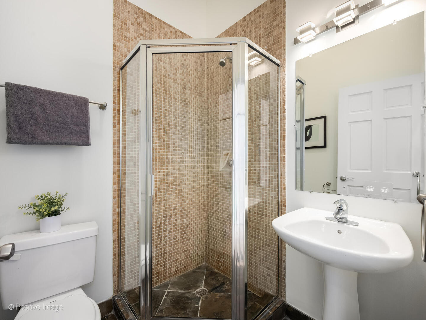 3053 North Clybourn Avenue, Unit 3 Chicago, IL 60618 - Photo 18 of 24 a bathroom with a sink toilet and shower