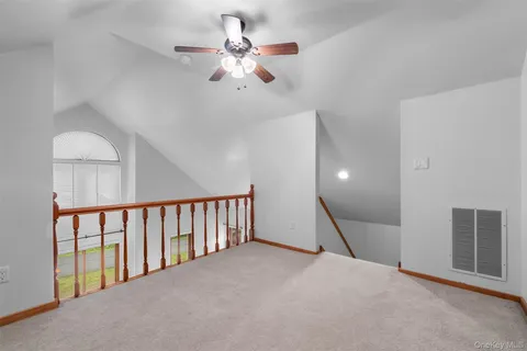 a view of a livingroom with a ceiling fan