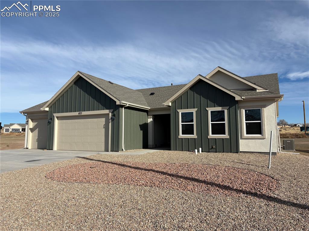 822 Keystone Loop Canon City, CO 81212 - Photo 13 of 14 a front view of a house with a yard