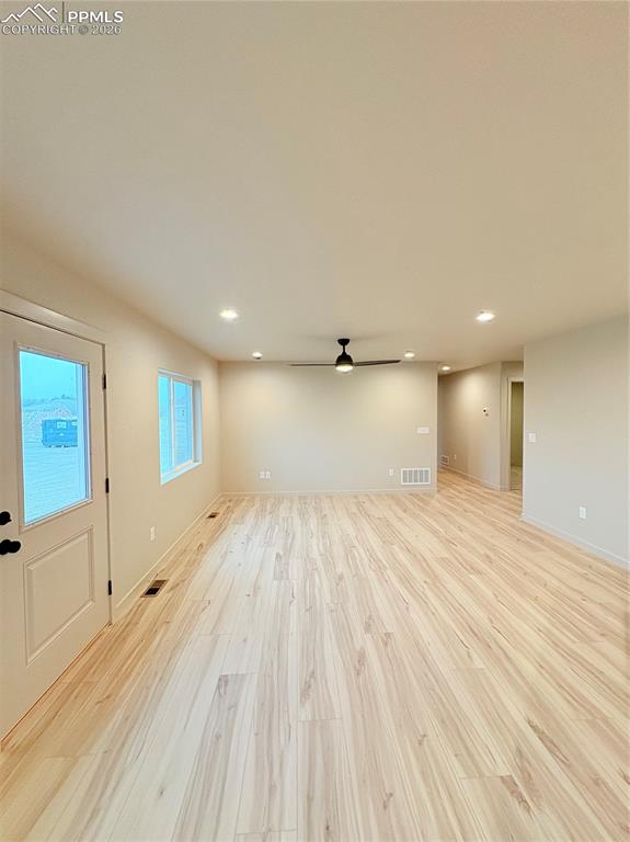 822 Keystone Loop Canon City, CO 81212 - Photo 6 of 14 a view of empty room with wooden floor