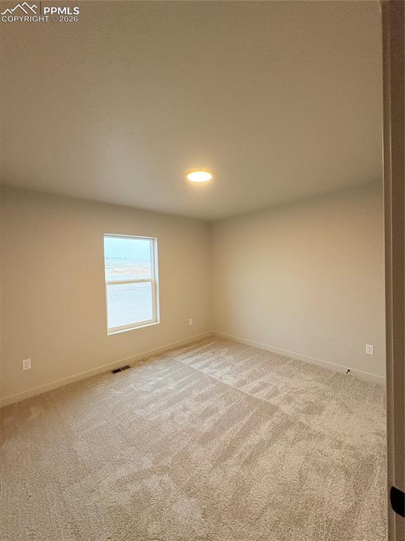 822 Keystone Loop Canon City, CO 81212 - Photo 10 of 14 an empty room with a window
