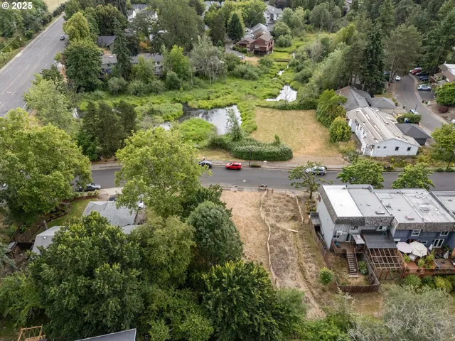 an aerial view of residential house with outdoor space