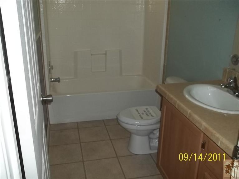 13442 Ocotillo Road Whitewater, CA 92282 - Photo 12 of 14 a bathroom with a toilet and a sink