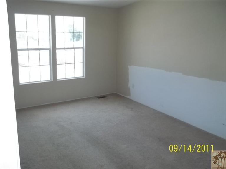 13442 Ocotillo Road Whitewater, CA 92282 - Photo 8 of 14 an empty room with a window